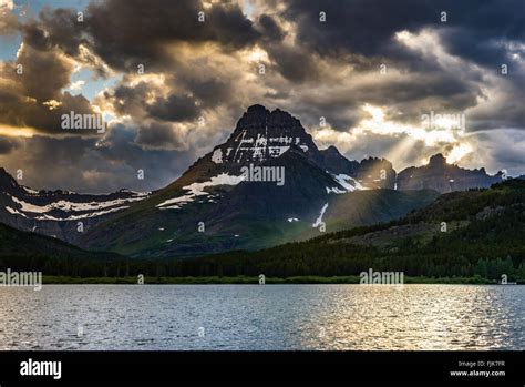 Colorful Sunset Over Swiftcurrent Lake In Glacier National Park