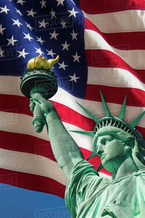 Statue Of Liberty Under Us Flag Stock Photo Dissolve