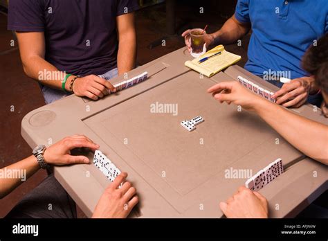 Young Men Playing Dominos Stock Photo Alamy