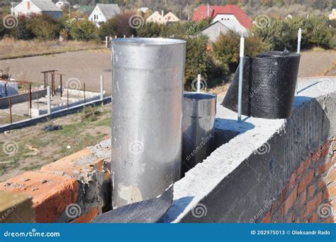 The Construction Of A Brick Chimney With Two Flues Steel Pipes