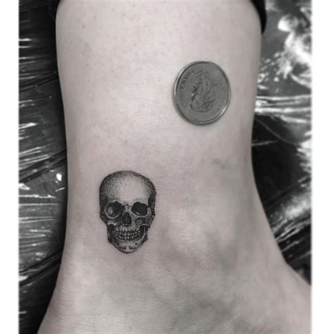 The small skull tattoo is a classical tattoo designs in modern body art. Pin by Samerichh on Small tattoos in 2020 | Skull hand ...