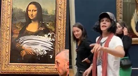 Mona Lisa Man Dressed As Old Woman Throws Cake At Da Vinci Painting