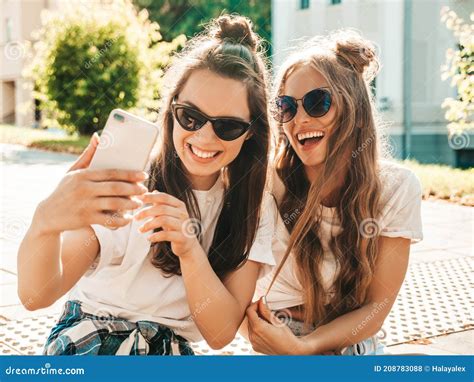 Portrait Of Beautiful Women Posing Outdoors Stock Photo Image Of