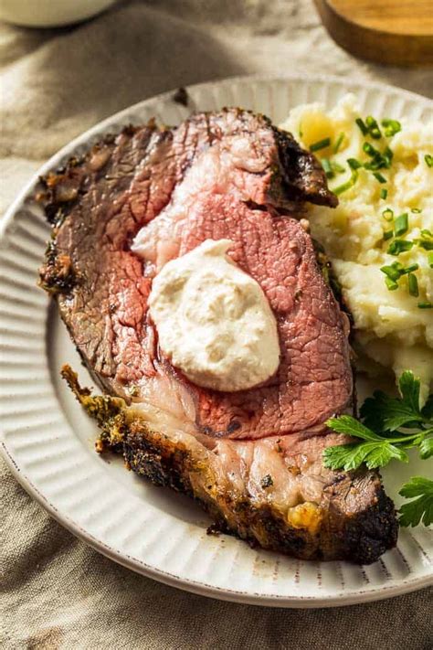 Prime rib roast, rubbed on all sides with black pepper and garlic powder, then drizzled with olive oil and cooked very rare. Learn how to cook a perfect prime rib roast every time ...
