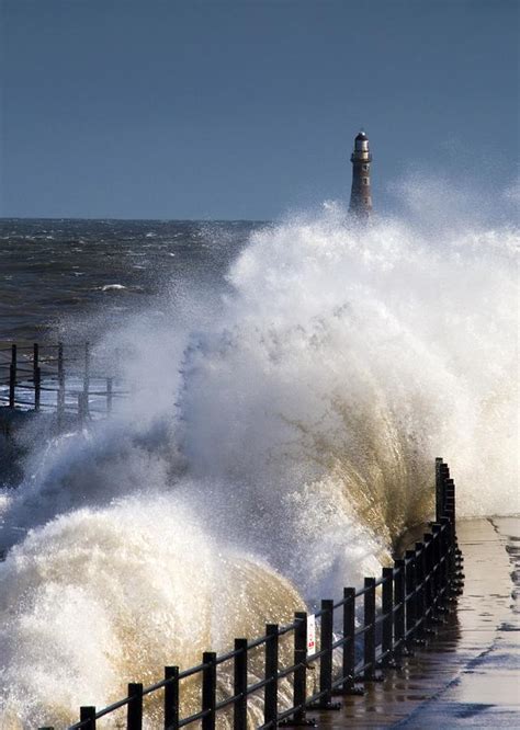 Waves Crashing By Lighthouse At Photograph By John Short
