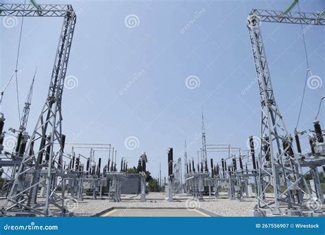 Aerial View Of Electrical Substation Surrounded By Metal Towers Stock