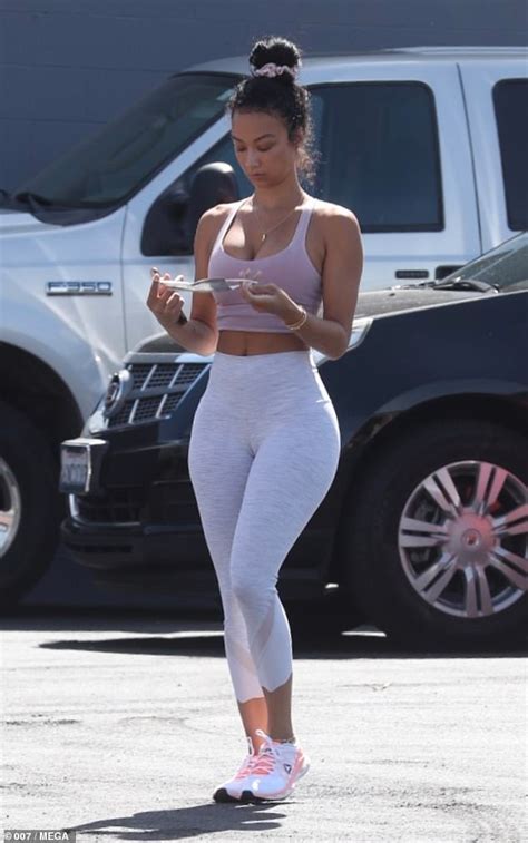 Draya Michele Dons Mask And Flaunts Curves In Leggings And Sports Bra