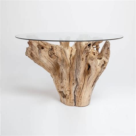 A standout statement piece for any living area. Driftwood Table with Glass Top For Sale at 1stdibs