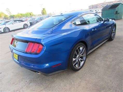 The ford mustang's face is familiar here at the car and driver office. 2017 Ford Mustang GT Premium 5 Miles Lightning Blue ...