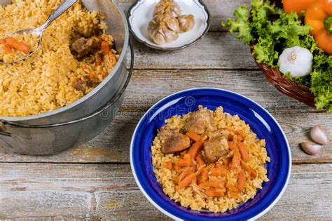 Traditional Uzbek Meal Called Pilaf Rice With Meat Carrot And Onion In