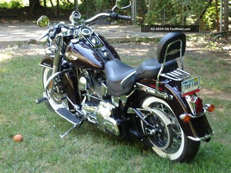 When we set out to build a custom motorcycle, we always look to give a set of eyes the deluxe treatment. 2005 Harley Davidson Softail Deluxe