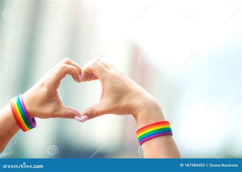 Pride Concept Hand Making A Heart Sign With Gay Pride Lgbt Rainbow Flag Stock Image Image Of
