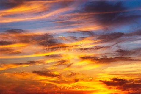 Golden Hour Twilight Sky And Cirrus Clouds Background Stock Photo