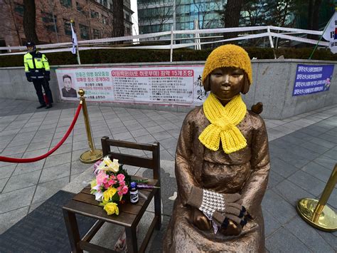 comfort woman memorial statues a thorn in japan s side now sit on korean buses kuer 90 1