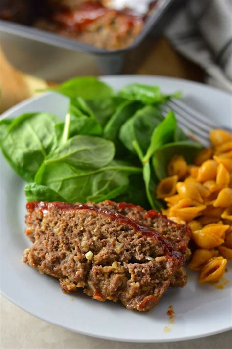 How to make the most amazing traditional meatloaf recipe with beef, bread crumbs, and an easy homemade sauce. Brown Sugar Meatloaf | A Taste of Madness
