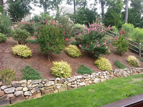 A Simple Guide To Hill Landscaping Ideas Sloped Backyard Landscaping Backyard Hill