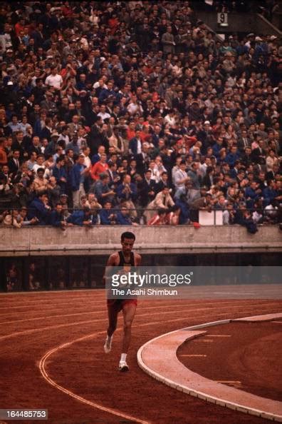 Abebe Bikila Of Ethiopia Competes In The Mens Marathon During Tokyo