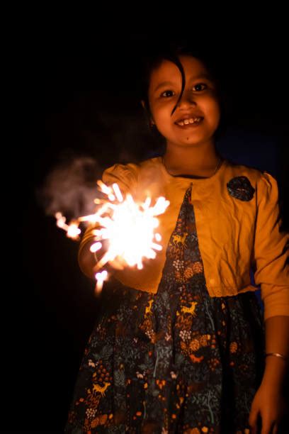 Kids Enjoying Firecracker Celebrating Diwali Festival Of India Stock