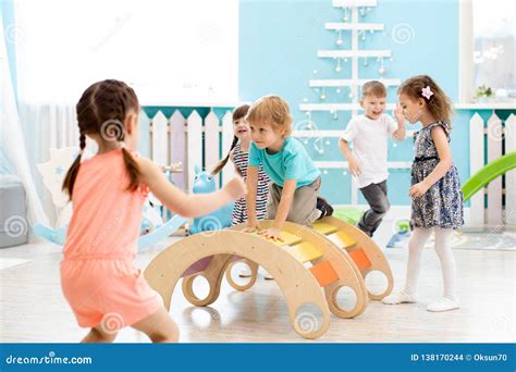 Children Playing In Kindergarten Stock Photo Image Of Girl Learning