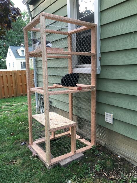 Huge bonus—it'll cost you less than $200! Catio! Simple outdoor cat enclosure using a few 2x4 and ...