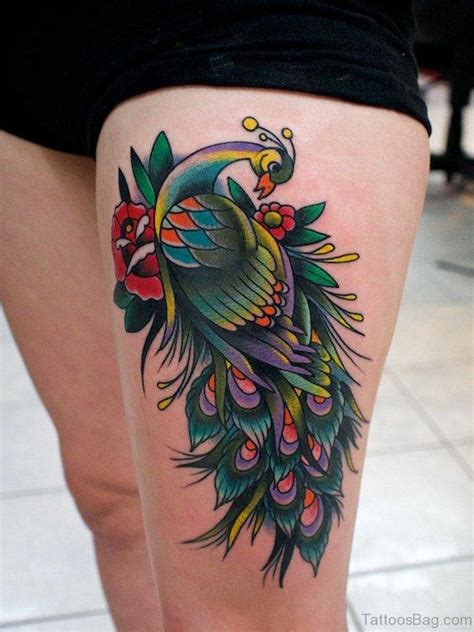 49 Superb Peacock Tattoo On Thigh Tattoo Designs
