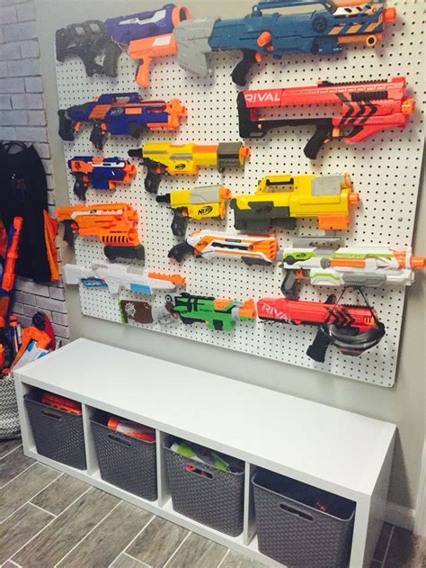 Have a bunch of nerf guns laying around and want to get them out of the way and also add an awesome nerf gun rack to your. Nerf Storage Wall | To Do | Nerf storage, Kids room, Nerf ...