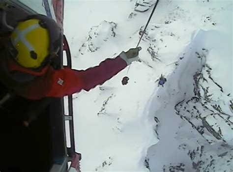 This Is The Moment A Helicopter Was Called In To Rescue Two Skiers Trapped On The Ledge Of A
