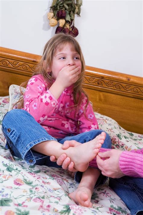 Mother Tickling Daughter Feet Stock Photos Free And Royalty Free Stock