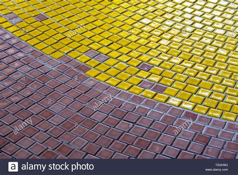 Yellow White And Brown Tiles On The Floor Of Hall Stock Photo Alamy
