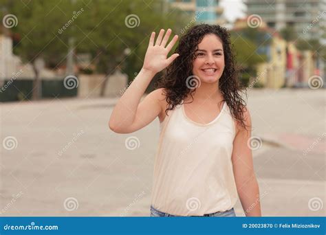 Woman Waving And Smiling Stock Photo Image Of Lady Urban