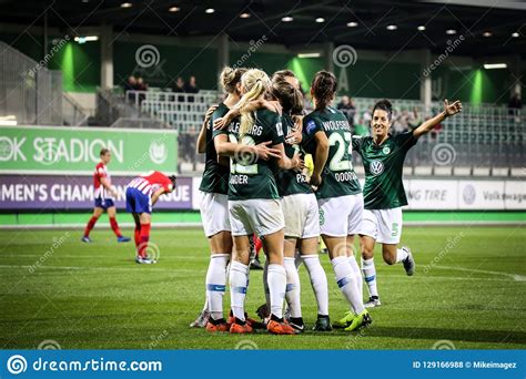 Female Footballers Celebrating A Goal During A Soccer Match Editorial