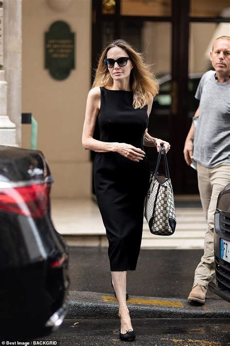Angelina Jolie Looks Chic In A Black Midi Dress As She Departs Her
