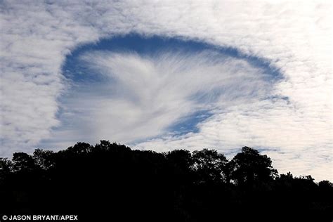 Strange Cloud Formation Leaves A Hole That Looks Like A Ufo Over