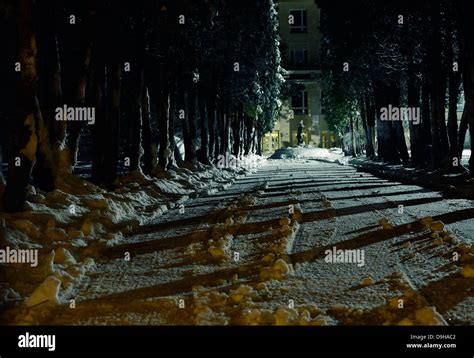 Snowy Alleyway At Night Stock Photo Alamy