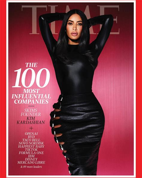 kim kardashian shows off her curves in skintight black bodysuit and cut out leather skirt for