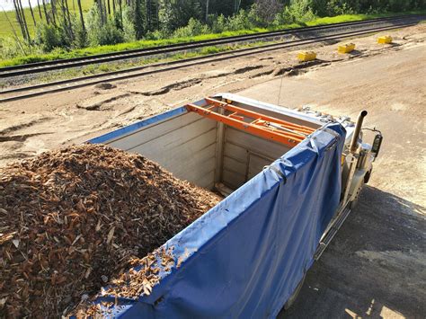 Wood Chip Trailer Tarping Challenges Valid Manufacturing Ltd