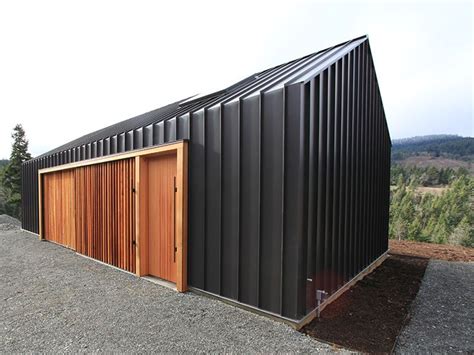Corrugated Metal With Clear Finished Wood Accents House Exterior