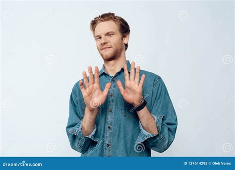 Portrait Of Attractive Young Man Hands Up Stock Photo Image Of