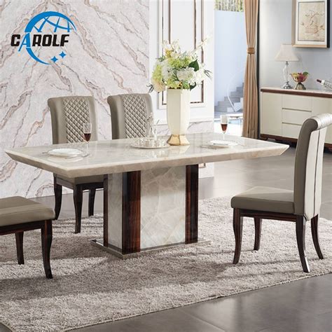 If you are going to go certain modern round designs work well with glass tops when the base is sculptural or the legs are. Modern dining table designs furniture marble stone 6 ...