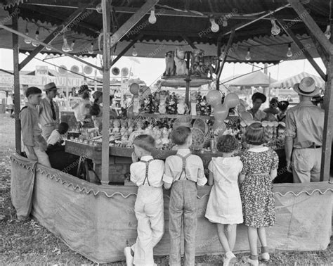 You can play your heart out, everyone dont get a ring though. traveling carnivals 1930s - Google Search (With images ...