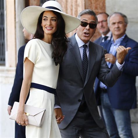 George clooney and amal clooney arrive for the wedding ceremony of britain's prince harry and us actress meghan markle at st george's chapel, windsor castle on may 19, 2018 in windsor, england. The star-studded wedding of the Clooney's