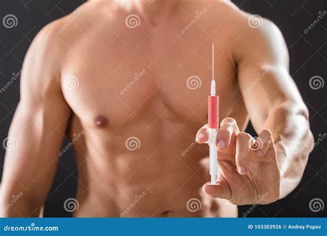 Shirtless Bodybuilder Man Holding Syringe In Hand Stock Photo Image Of Male Health