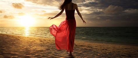 2560x1080 Women Beach Sand Walking Red Dress 2560x1080 Resolution Hd 4k Wallpapers Images
