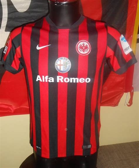 The special red and white eintracht frankfurt alfa romeo 2016 jersey features various details that honor the city that is located in the center of limited to 1500 shirts, the special eintracht frankfurt 2016 alfa romeo jersey retails at a price of 85 euro, which makes it the most expensive shirt in the. Eintracht Frankfurt Home football shirt 2014 - 2015 ...