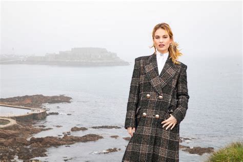 Lily James At The Guernsey Literary And Potato Peel Pie Society Photocall In Guernsey 04 12 2018