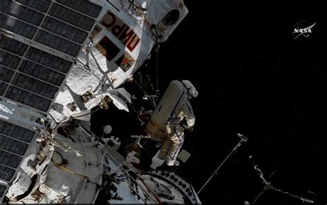 spacewalk russian cosmonauts step out of the international space station for a spacewalk