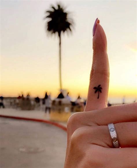 Minimalistic Palm Tree Tattoo Done On The Finger