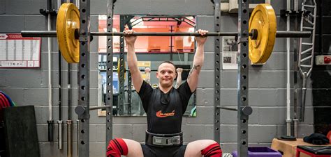 powerlifting world champion with down syndrome defies odds after being told he d never achieve