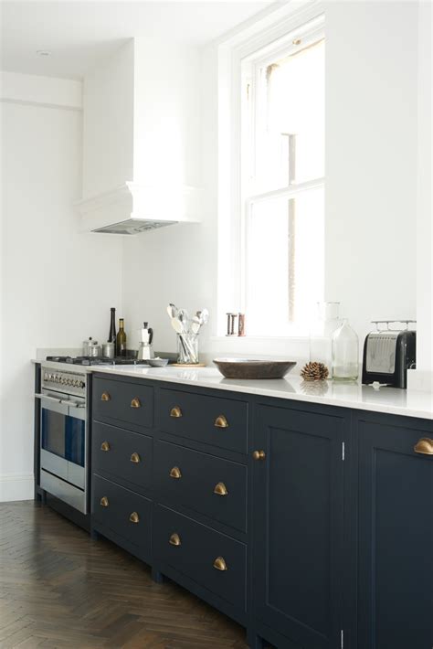 The clean, classic look of shaker cabinets transcends fads, so they work with any kitchen design. Pantry Blue and Parquet, a perfect match. - The deVOL ...