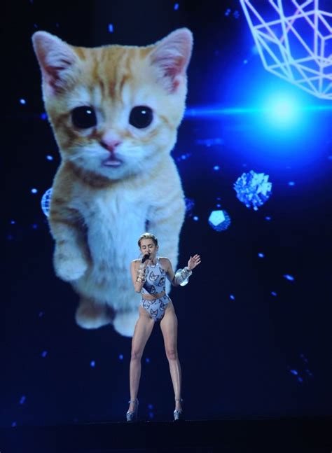 Miley Cyrus Performs Wrecking Ball Next To A Giant Lip Syncing Cat